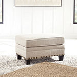 Signature Design by Ashley Claretha Collection Upholstered Ottoman