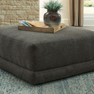 Signature Design by Ashley® Evey Cushioned Upholstered Ottoman