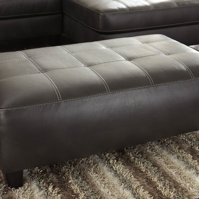 Signature Design by Ashley Nokomis Upholstered Ottoman