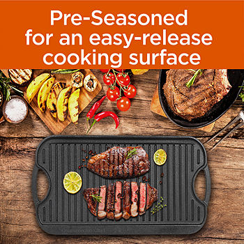 Lodge Reversible Pro Grid Iron Grill/Griddle on a glass-top stove