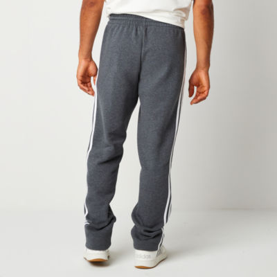 grey adidas sweatpants with white stripes