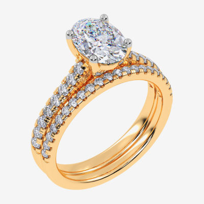 (H-I / Si2-I1) Womens 1 1/2 CT. T.W. Lab Grown White Diamond 10K or 14K Gold Oval Side Stone Bridal Set