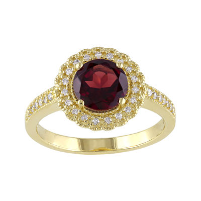 Genuine Garnet and 1/7 CT. T.W. Diamond Ring