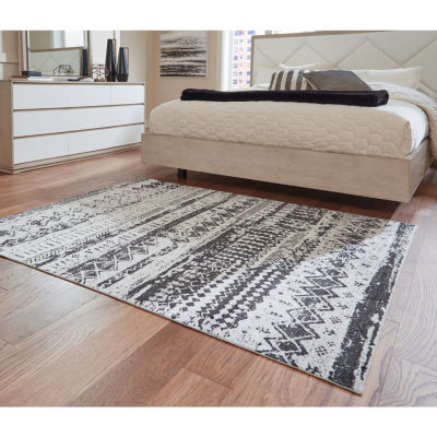 Signature Design by Ashley� Devman Washable Indoor Rectangular Area Rug