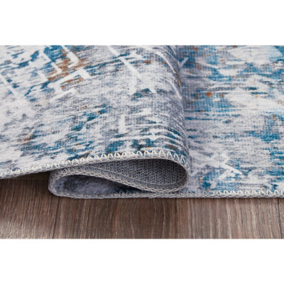 Signature Design by Ashley� Garyard Washable Indoor Rectangular Area Rug