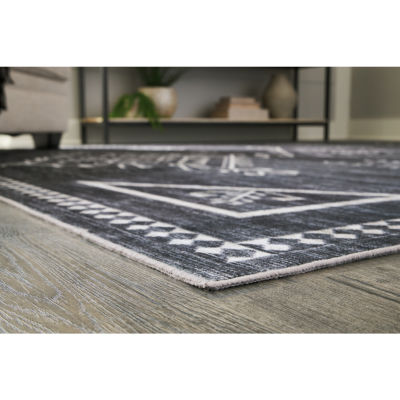 Signature Design by Ashley� Arloman Washable Indoor Rectangular Area Rug