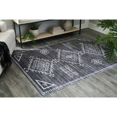 Signature Design by Ashley� Arloman Washable Indoor Rectangular Area Rug