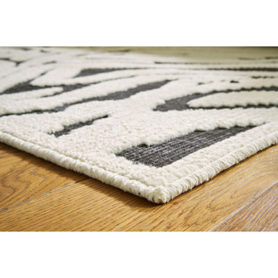 Signature Design by Ashley� Thomwith Washable Indoor Rectangular Area Rug