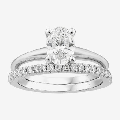 1 1/4 CT. T.W. Oval Lab-Grown (H / SI2) Diamond Solitaire Bridal Set in 10K or 14K Gold