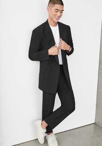 Slim Fit Narrower through the chest.  Higher armholes. Fitted trousers.