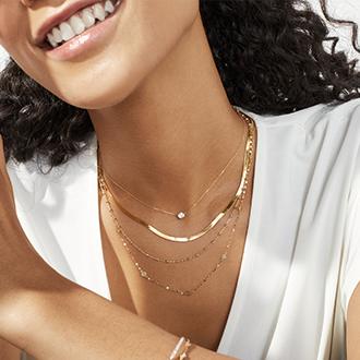 Stack Hack: Choose necklaces of different lengths  for a cascading effect.